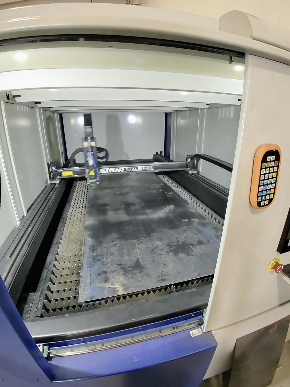 Custom flag design laser cut on the machine bed